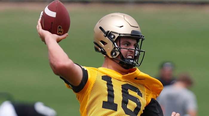 Purdue Boilermakers quarterback Aidan O’Connell (16) throws the ball during a practice, Tuesday, Aug. 2, 2022, at Purdue University in West Lafayette, Ind.